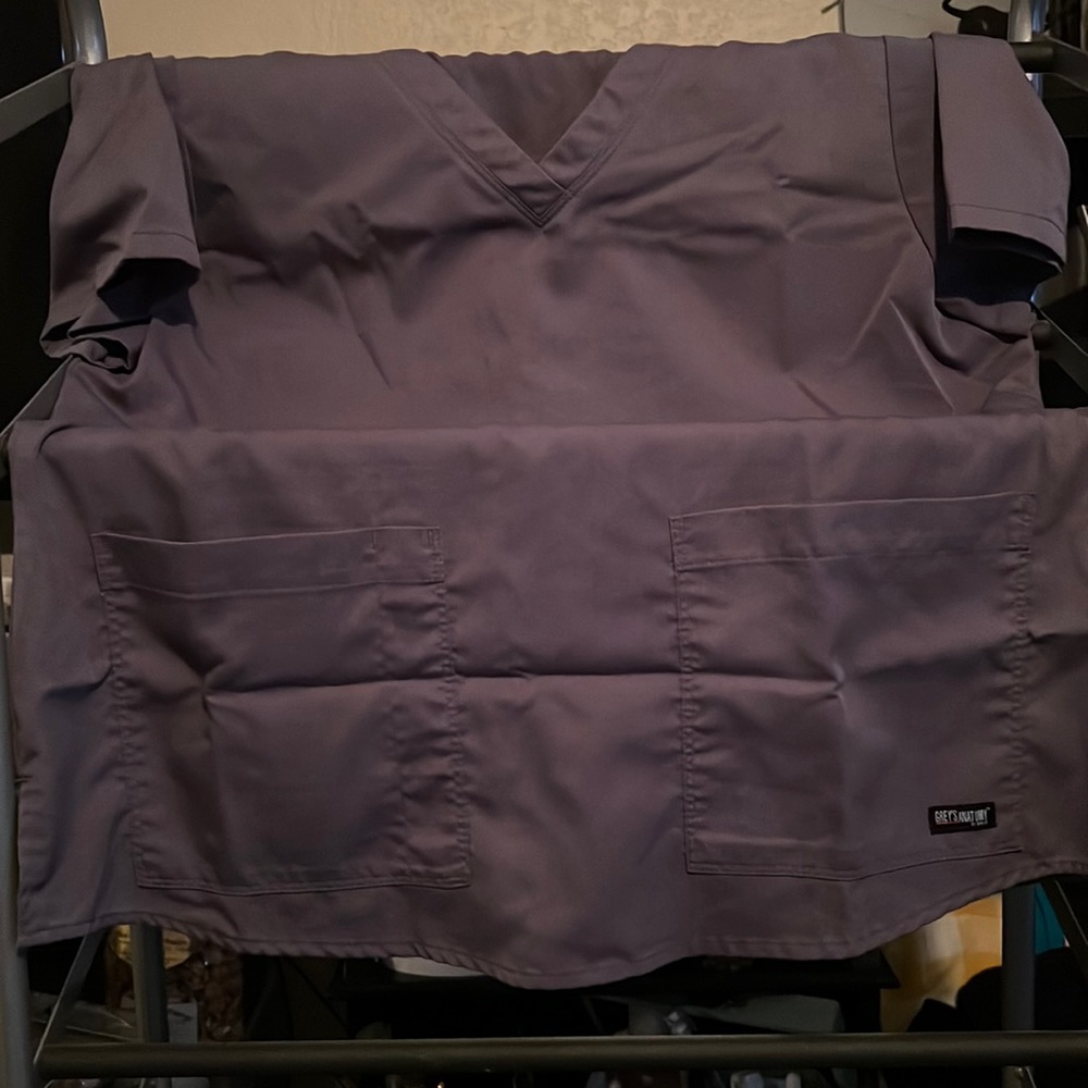 Woman’s grey scrubs